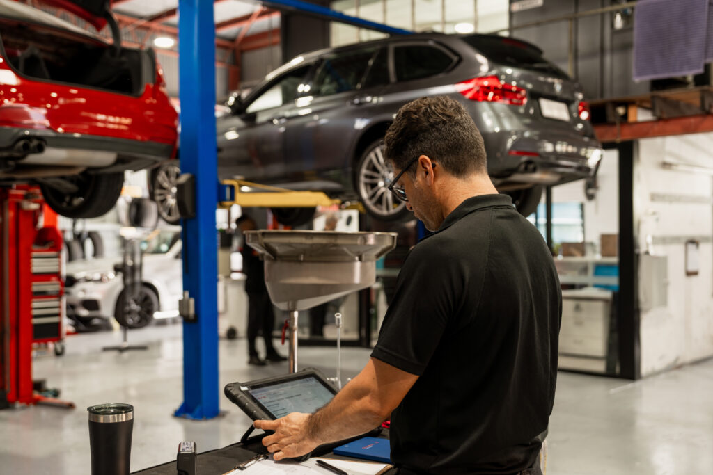 Mechanic at Luxe Autohaus doing Brisbane logbook service